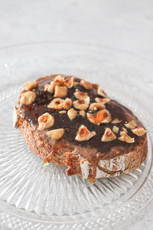 Another Take on Toast: Almond Butter Toast Topped with Fig Jam, Nuts and Maple Syrup