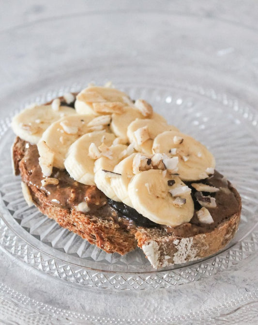 Another Take on Toast: Toast Topped with Almond Butter, Chocolate Spread, Banana Slices and Coconut